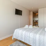 Апартаменты Stylish With Balcony & Garage By Hostwise